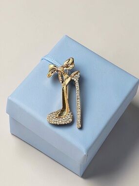 Gold Crystal Stiletto Brooch with Bow